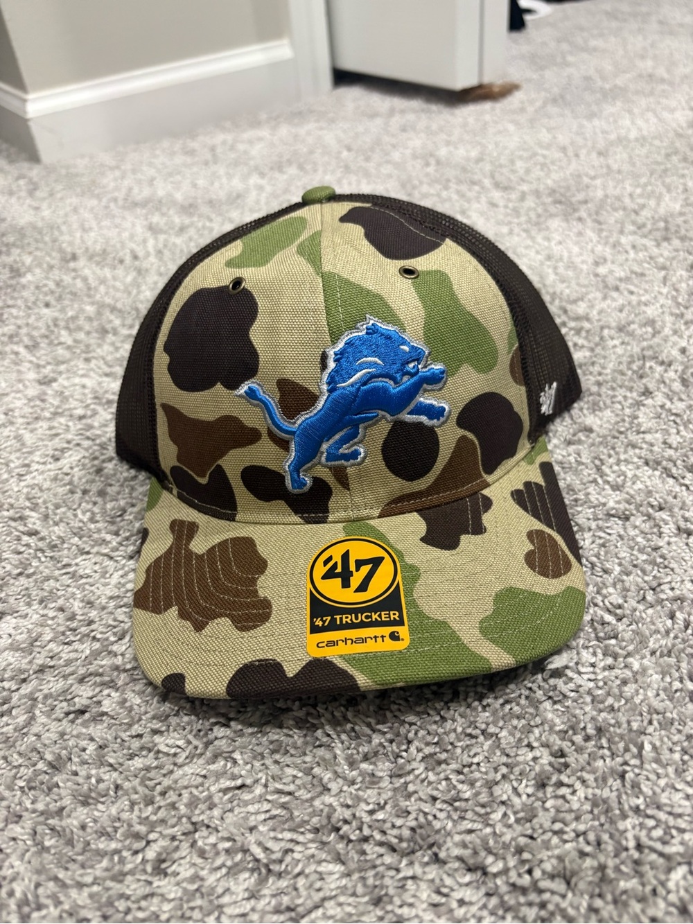Brand New Carhartt Camo Trucker Hat with Blue Detroit Lions Logo